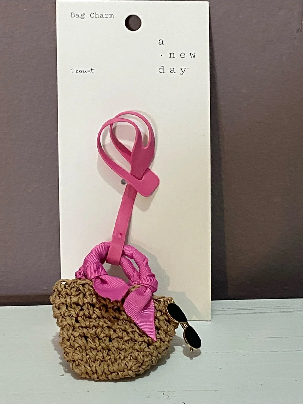 a new day - Pink Ribbon Straw Bag Charm with Black Sunglasses Accent